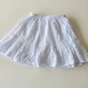Falda con short de broderie blanca (circ.)